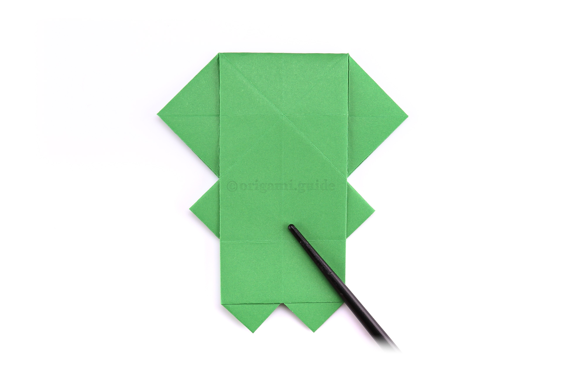 Step 38 - Flip the paper over to the other side.