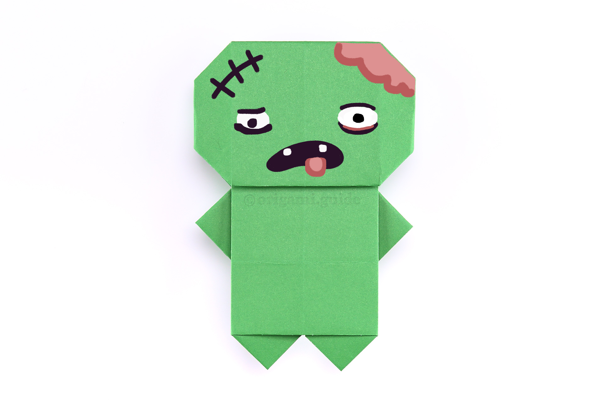 Step 44 - Draw a creepy zombie face! We'd love to see your origami zombie in the comments!