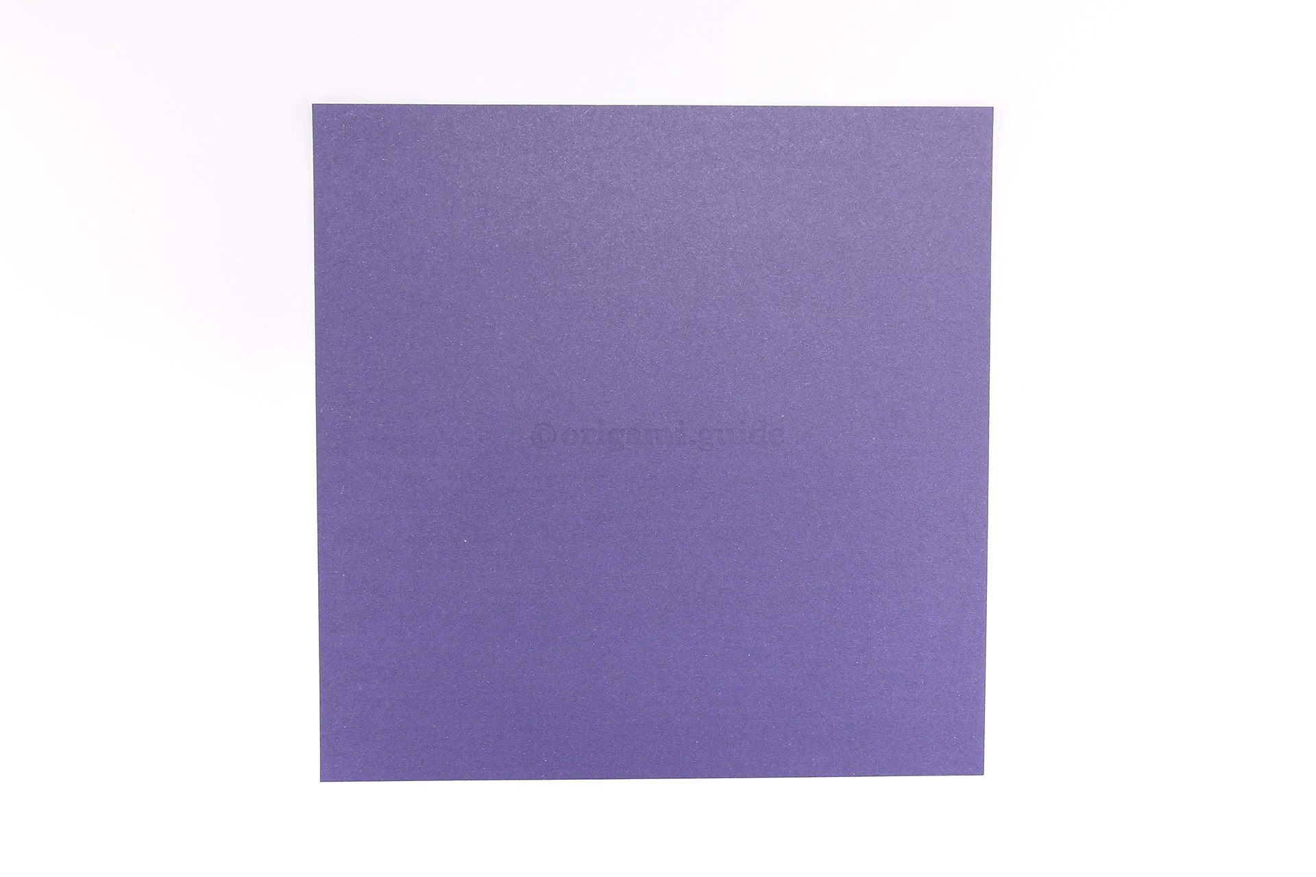 Step 1 - We used origami paper that has the same colour on each side, if you use paper that has two different colours, the rim with be a different colour from the top.